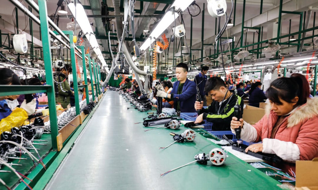 Page-9-in-Jiangxi-province-of-eastern-China-workers-in-the-electric-fan-assembly-line-of-AIRMATE-Co.jpeg