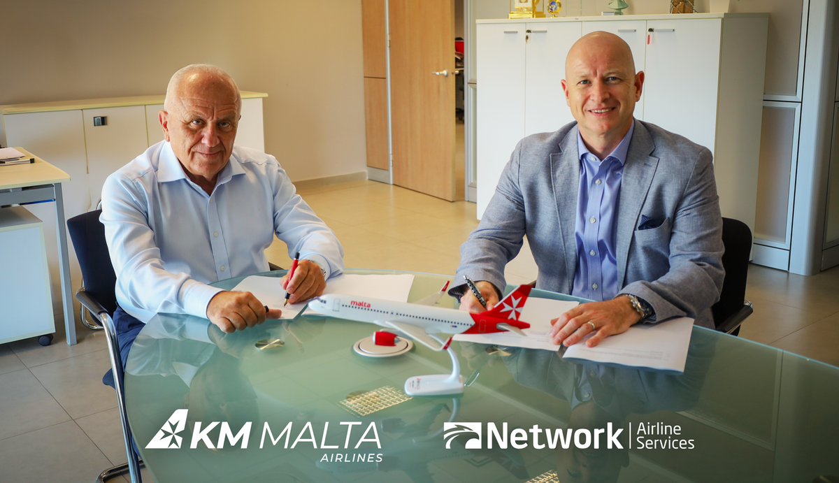 David-Curmi-and-Jonathan-Clark-Signing-the-Renewal-Contract-v2.png